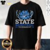 Original State Basketball Tournament 2026 Ship Logo T-Shirt featuring a vibrant design and team colors, perfect for fans.