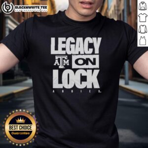 Alt Text: Original Texas A&M Aggies NCAA 2026 Legacy On Lock On Logo T-Shirt featuring the iconic Aggies logo and vibrant colors.