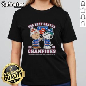 Alt Text: Cute Charlie Brown fist bump with Snoopy celebrating USA Hockey's gold medal win over Canada at the 2026 Winter Olympics.