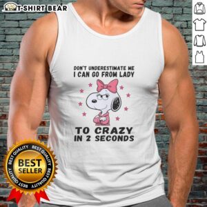 Stylish tank top featuring Snoopy with 'Don't Underestimate Me' quote, perfect for casual wear and playful fashion.