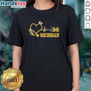 Alt Text: Nice Michigan Wolverines nurse lover heartbeat baseball ladies tee featuring vibrant graphics and comfortable fit.