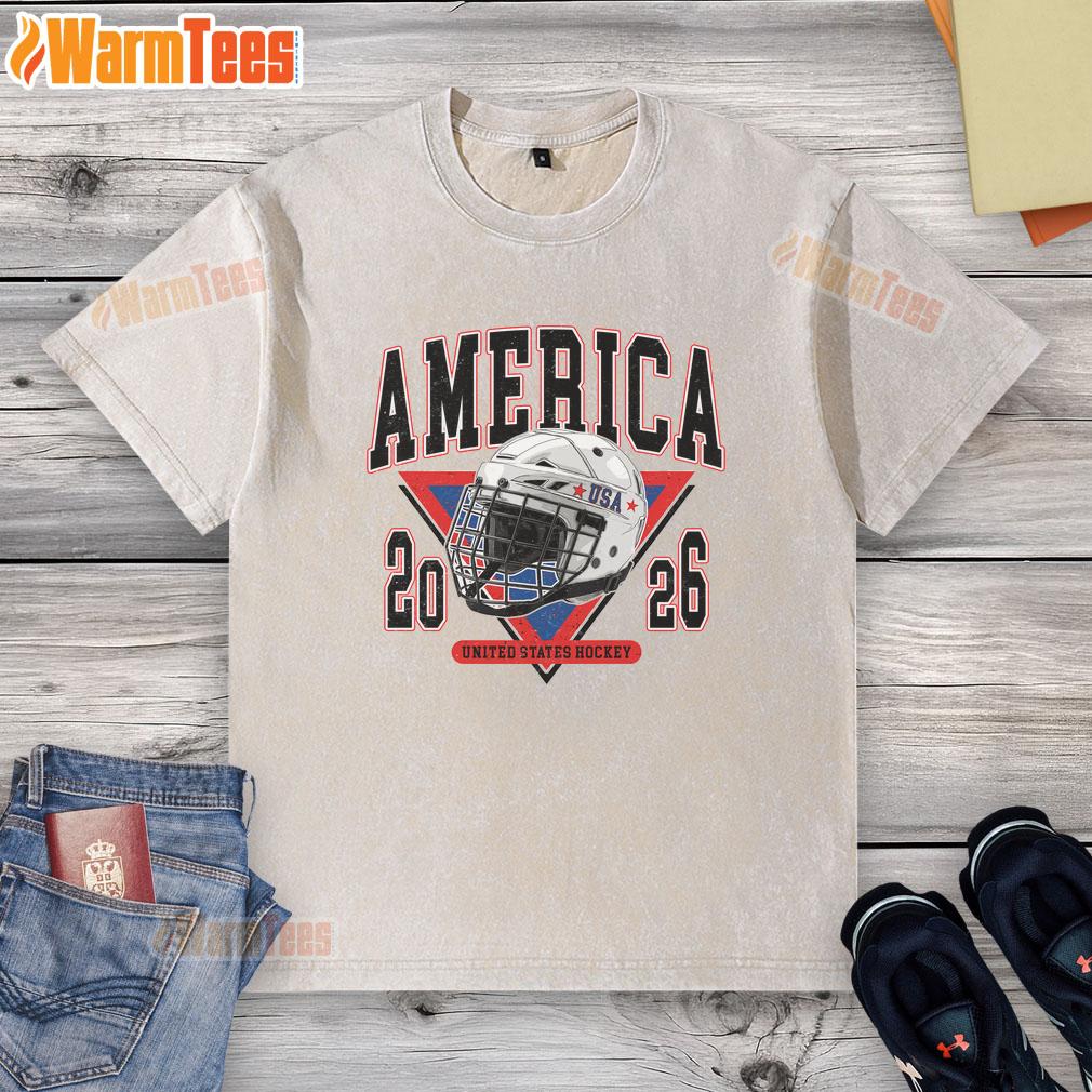 premium-america-united-states-hockey-champions-2026-usa-washed-t-shirt Premium USA Hockey Champions 2026 washed T-shirt featuring the United States flag and bold team graphics.