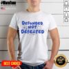 Premium Defunded Not Defeated Austin PBS slogan T-shirt showcasing bold text design on a stylish fit.