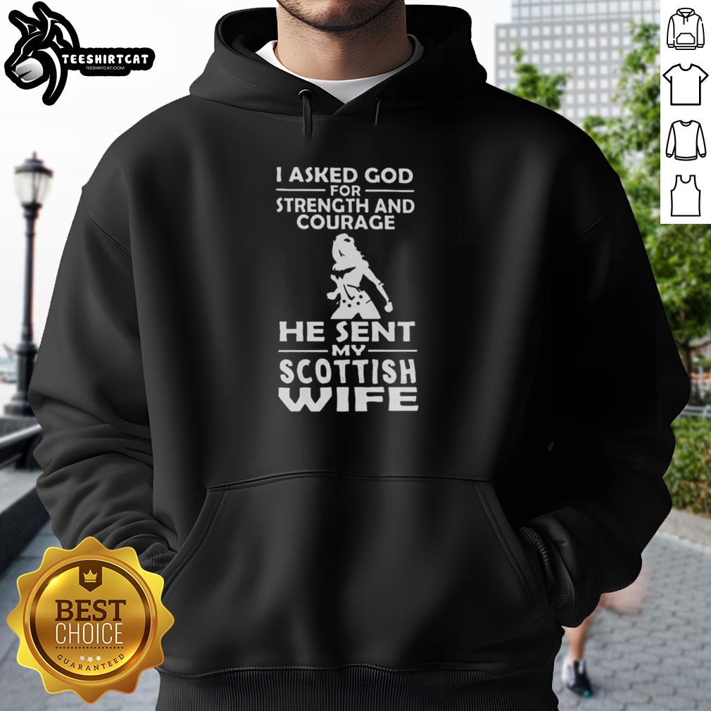 premium-i-asked-god-for-strength-and-courage-he-sent-my-scottish-wife-hoodie Premium hoodie featuring 'I Asked God For Strength And Courage, He Sent My Scottish Wife' design, perfect for proud husbands.