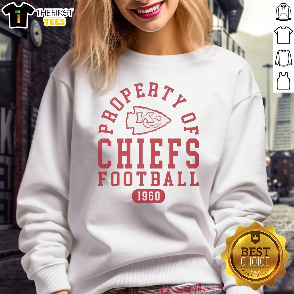 premium-kansas-city-chiefs-football-property-1960-sweatshirt Alt Text: Premium Kansas City Chiefs Football Property 1960 sweatshirt featuring classic team colors and logo design.