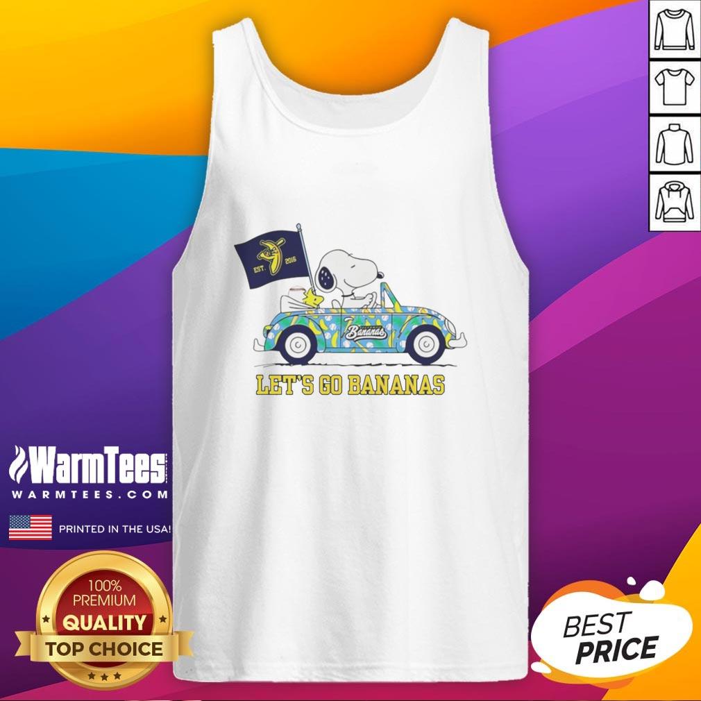 premium-snoopy-and-woodstock-driving-car-lets-go-savannah-bananas-tank-top Alt Text: Premium Snoopy and Woodstock driving a car on a tank top, perfect for Savannah Bananas fans and summer fun.