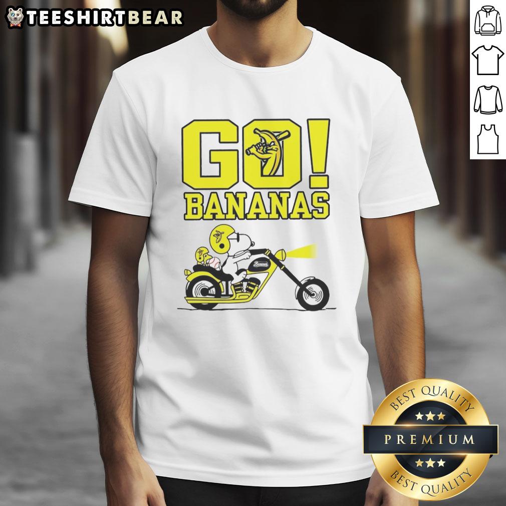 premium-snoopy-and-woodstock-driving-x-savannah-bananas-go-bananas-t-shirt-1 Premium Snoopy and Woodstock driving with Savannah Bananas logo on fun T-shirt, perfect for baseball fans.