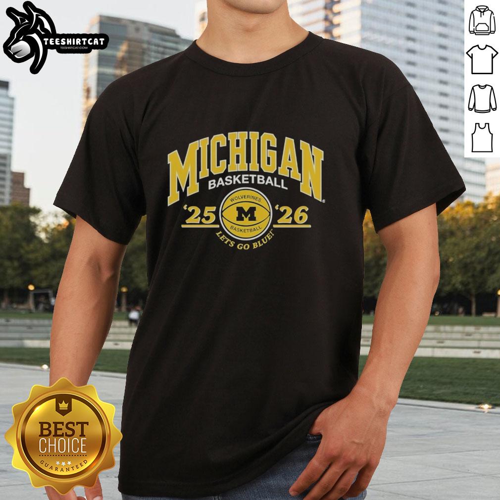 premium-university-of-michigan-2025-2026-basketball-lets-go-blue-t-shirt Premium University of Michigan 2025-2026 basketball 'Let's Go Blue' T-shirt featuring team colors and logo.