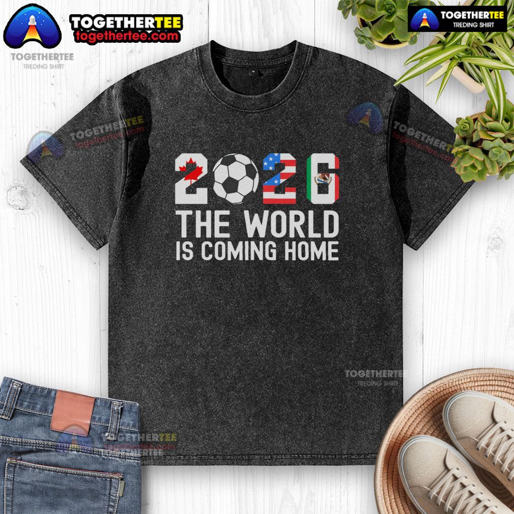 Pretty 2026 The World Is Coming Home World Cup Football Washed T Shirt Pretty 2026 World Cup Football washed t-shirt showcasing vibrant design and sporty style, perfect for fans and collectors.