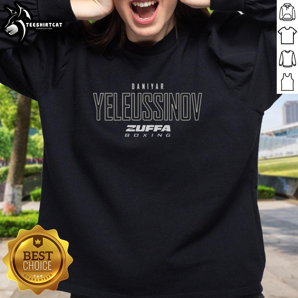 pretty-daniyar-yeleussinov-zuffa-boxing-elite-sweatshirt Alt Text: Daniyar Yeleussinov wearing a stylish Zuffa Boxing Elite sweatshirt, showcasing his athletic style and passion for boxing.