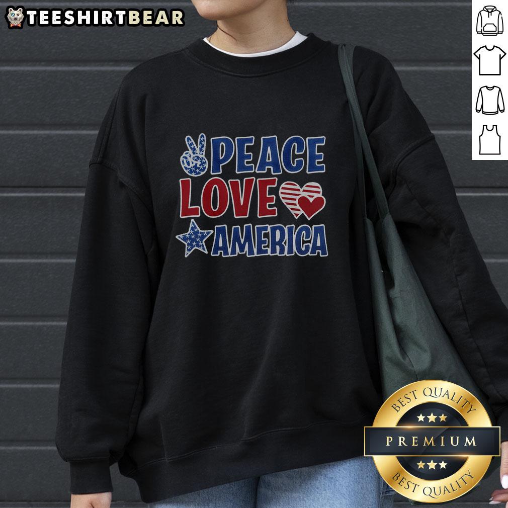 pretty-peace-love-america-sweatshirt Alt Text: Cozy Pretty Peace Love America Sweatshirt featuring a stylish graphic design, perfect for casual wear and patriotic vibes.