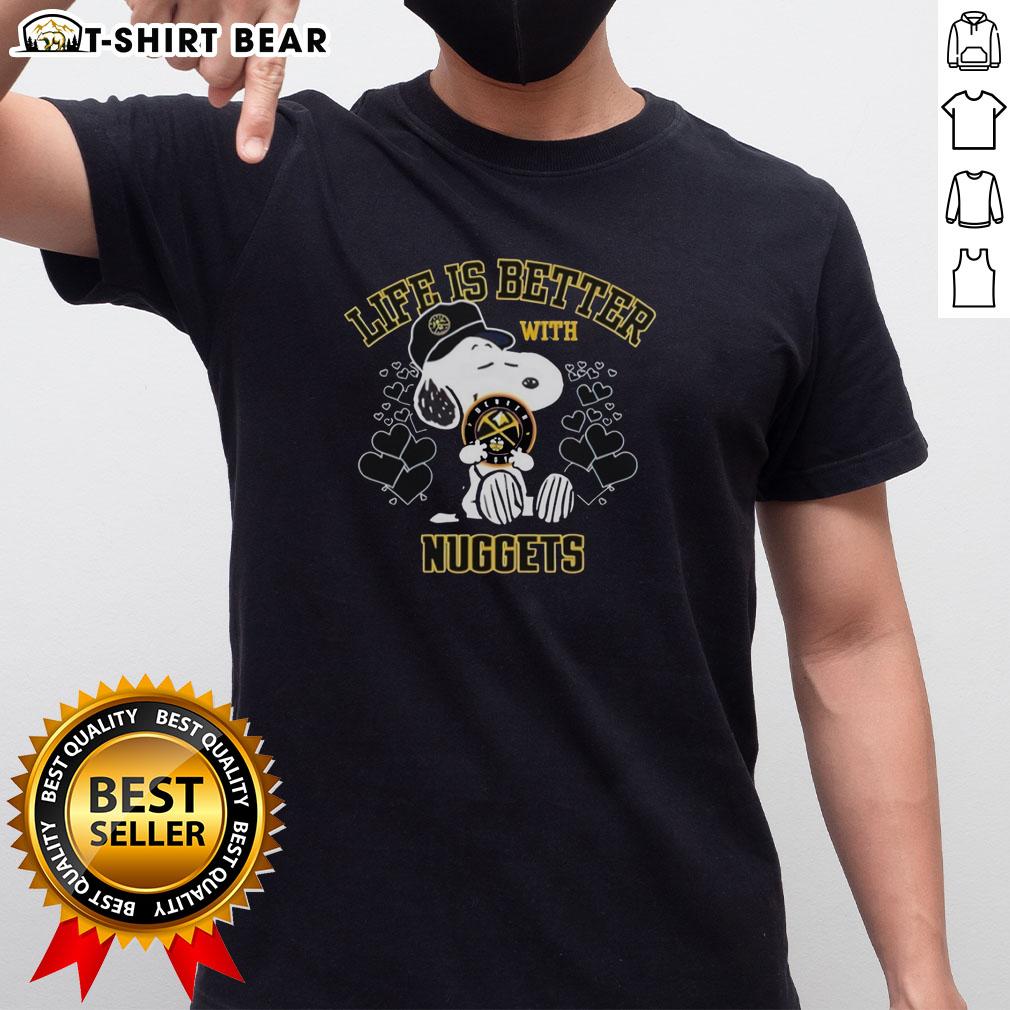 Pretty Snoopy Holding Denver Nuggets Warriors Logo Life Is Better With Nuggets T-Shirt Alt Text: Pretty Snoopy wearing a Life Is Better With Nuggets T-shirt featuring the Denver Nuggets Warriors logo.