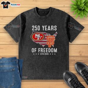 Original America San Francisco 49ers and Giants 250 Years of Freedom washed t-shirt featuring team logos and vibrant colors.