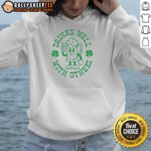 Original Drinks Well With Others Shamrock St. Patrick's Day Hoodie featuring a festive green design and playful text.
