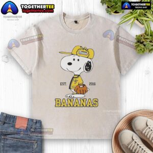 Snoopy wearing a Savannah Bananas outfit on a washed t-shirt, showcasing a fun and stylish baseball-themed design.