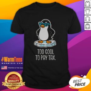 Nice penguins graphic on a 'Against Tariffs Too Cool To Pay Tax' T-shirt, promoting a playful stance on tax issues.