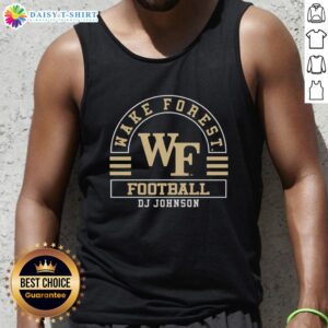 Alt Text: DJ Johnson wearing a Wake Forest Demon Deacons football tank top at an NCAA game, showcasing team spirit.