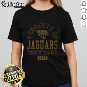 Alt Text: Premium Jacksonville Jaguars Football Property 1995 Ladies Tee featuring team logo and stylish design for fans.