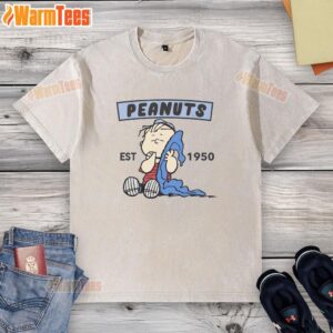 Alt Text: Cute Peanuts Linus Est 1950 washed t-shirt featuring a vibrant graphic of Linus from the Peanuts comic strip.