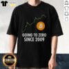 Bitcoin T-shirt featuring 'Top Going To Zero Since 2009' design, perfect for crypto enthusiasts and humor lovers.