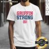 Top Griffin Strong T-Shirt featuring a bold design and vibrant colors, perfect for showcasing strength and style.