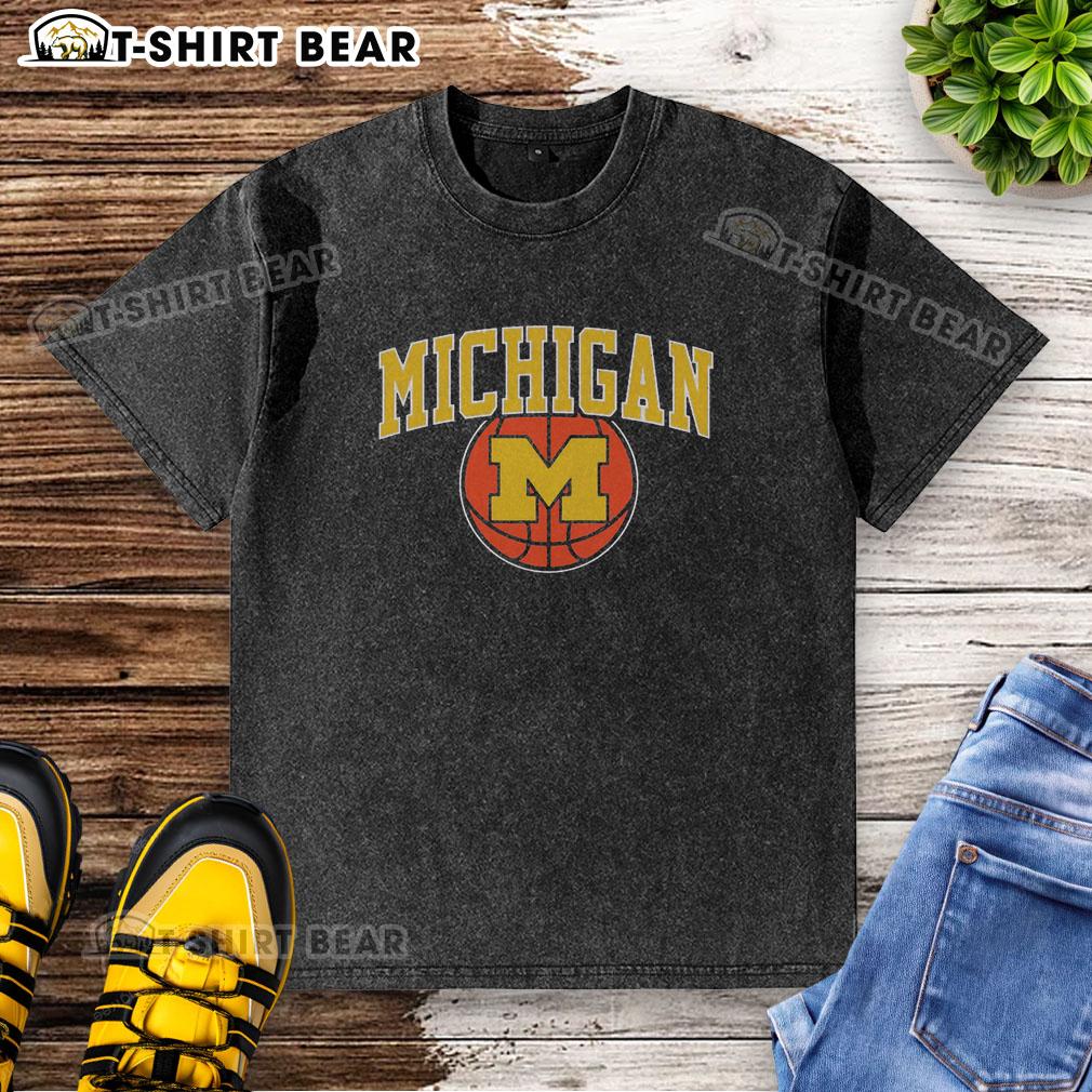 Top Michigan Basketball Vintage Washed T Shirt Vintage washed t-shirt featuring Michigan basketball logo, perfect for fans and collectors of Michigan sports apparel.