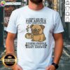 Top Pug t-shirt featuring humorous quote: 'Don't Ask Me For Advice, I Think Punching Stupid People Is Right' design.