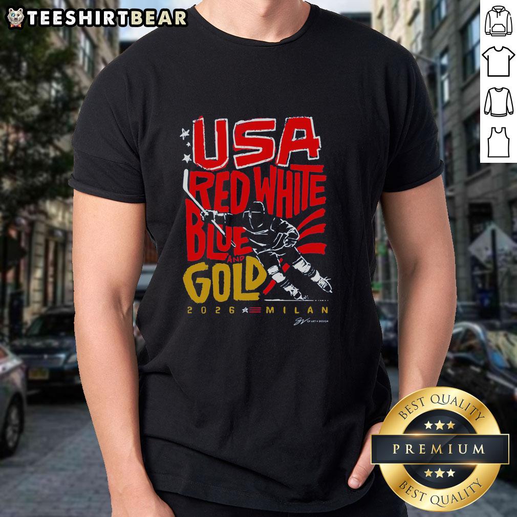top-usa-hockey-red-white-blue-and-gold-2026-milan-t-shirt Alt Text: Top USA Hockey red, white, blue, and gold 2026 Milan T-shirt featuring vibrant graphics and patriotic design.