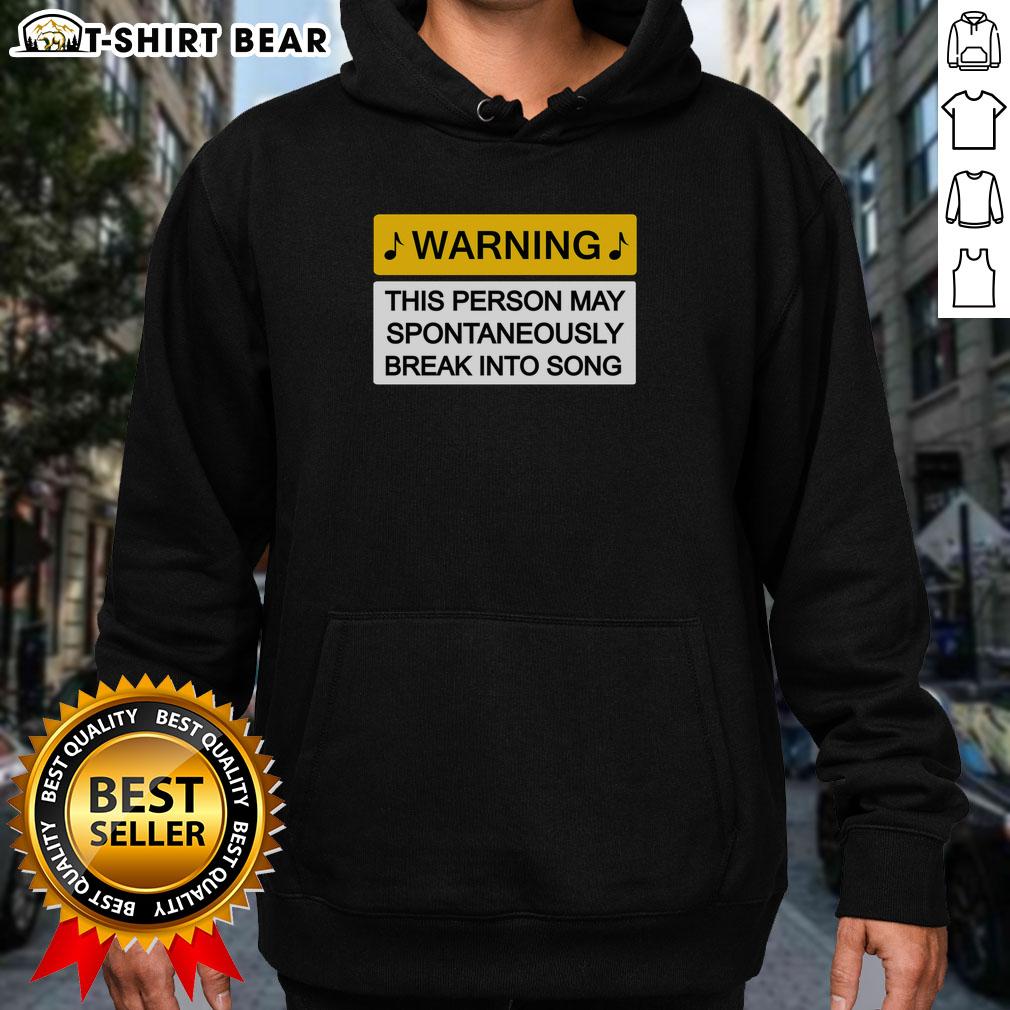 Top Warning May Break Into Song Hoodie Cozy Top Warning May Break Into Song Hoodie displayed on a mannequin, perfect for music lovers and casual wear.