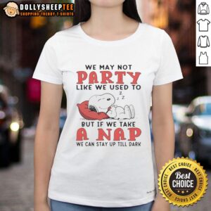 Alt Text: Cute Snoopy graphic on a ladies tee, featuring the quote about napping and staying up till dark.