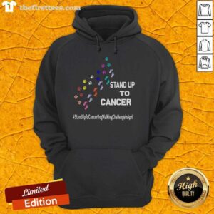 Person in a hoodie with 'Top Dog' and paw print, promoting the Stand Up To Cancer dog walking challenge in April.