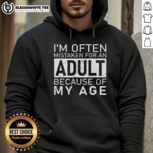 Teen wearing 'Nice, I'm Often Mistaken for an Adult' hoodie, showcasing stylish youth fashion and playful humor.