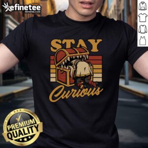 Alt Text: Funny Frieren Elf Anime Treasure Stay Curious T-Shirt featuring a whimsical elf graphic and vibrant colors.
