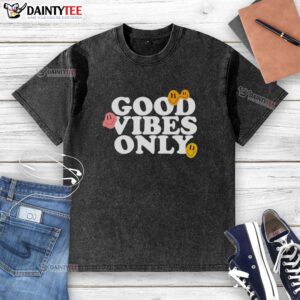 Alt Text: Good Vibes Only smiling face emoji graphic on a washed t-shirt, perfect for casual wear and positive vibes.