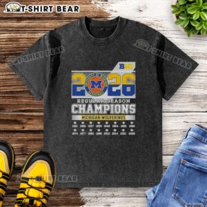 Original 2026 Big Ten Regular Season Champions Michigan Wolverines washed t-shirt featuring team logo and colors.