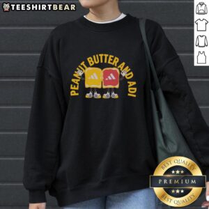 Top Peanut Butter and Adi Adidas sweatshirt featuring a trendy design and vibrant colors, perfect for casual wear.