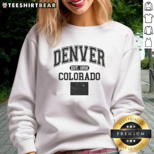 Alt Text: Official Denver Colorado Est 1858 varsity sweatshirt showcasing a classic design in navy blue and gold colors.
