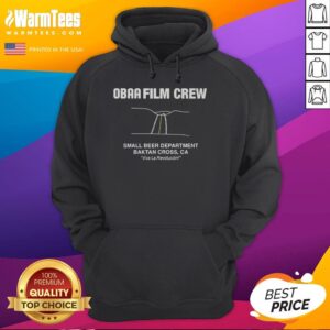 Alt Text: Hot Obaa film crew wearing Baktan Cross CA hoodie while enjoying small beers on set, showcasing a fun filming atmosphere.