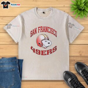 Alt Text: Premium San Francisco 49ers Snoopy Freedom 2026 logo washed t-shirt featuring a vibrant design and comfortable fit.