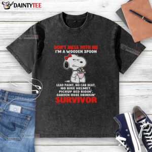 Grumpy Snoopy graphic on a washed t-shirt with 'Don't Mess With Me' slogan, featuring a wooden spoon design.
