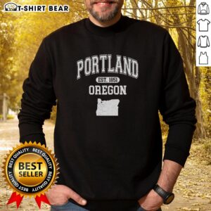 Alt Text: Pretty Portland Oregon Est 1851 varsity sweatshirt featuring iconic city design and vibrant colors.