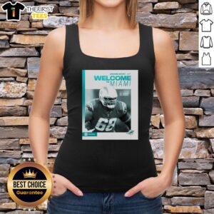 Hot Jamaree Salyer in Miami Dolphins 'Welcome to Miami' tank top, showcasing team spirit and summer style.