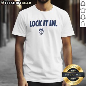 Official UConn Huskies 2026 Lock It In T-Shirt featuring team logo and vibrant design for fans and supporters.
