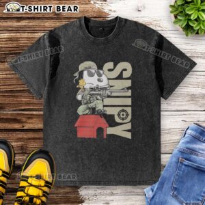Snoopy the sniper and Woodstock sitting on a doghouse on a washed t-shirt, showcasing a playful cartoon design.