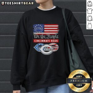 Top We The People Cincinnati Reds sweatshirt celebrating American pride since 1776, perfect for fans and casual wear.