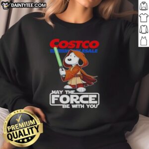 Alt Text: Cute Snoopy sweatshirt from Costco Wholesale featuring 'May The Force Be With You' design for fans and collectors.