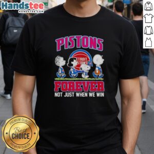 Alt Text: Official Peanuts Characters X Detroit Pistons Forever T-Shirt featuring iconic characters and team logo design.
