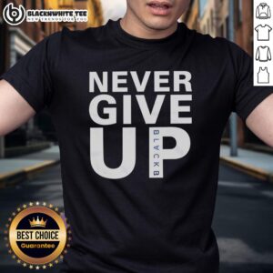 Nice Mohamed Salah wearing a 'Never Give Up' T-shirt, showcasing his inspiring attitude and sportsmanship.
