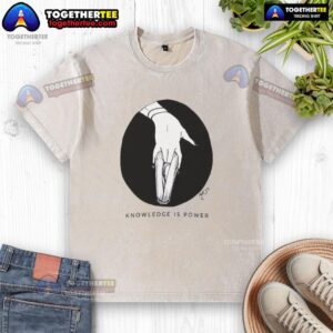 Good Knowledge Is Power washed t-shirt in a casual style, featuring bold typography on a soft fabric background.