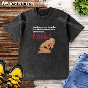 Trendy washed t-shirt featuring the phrase 'The World Doesn't Revolve Around Me' in bold lettering for casual wear.